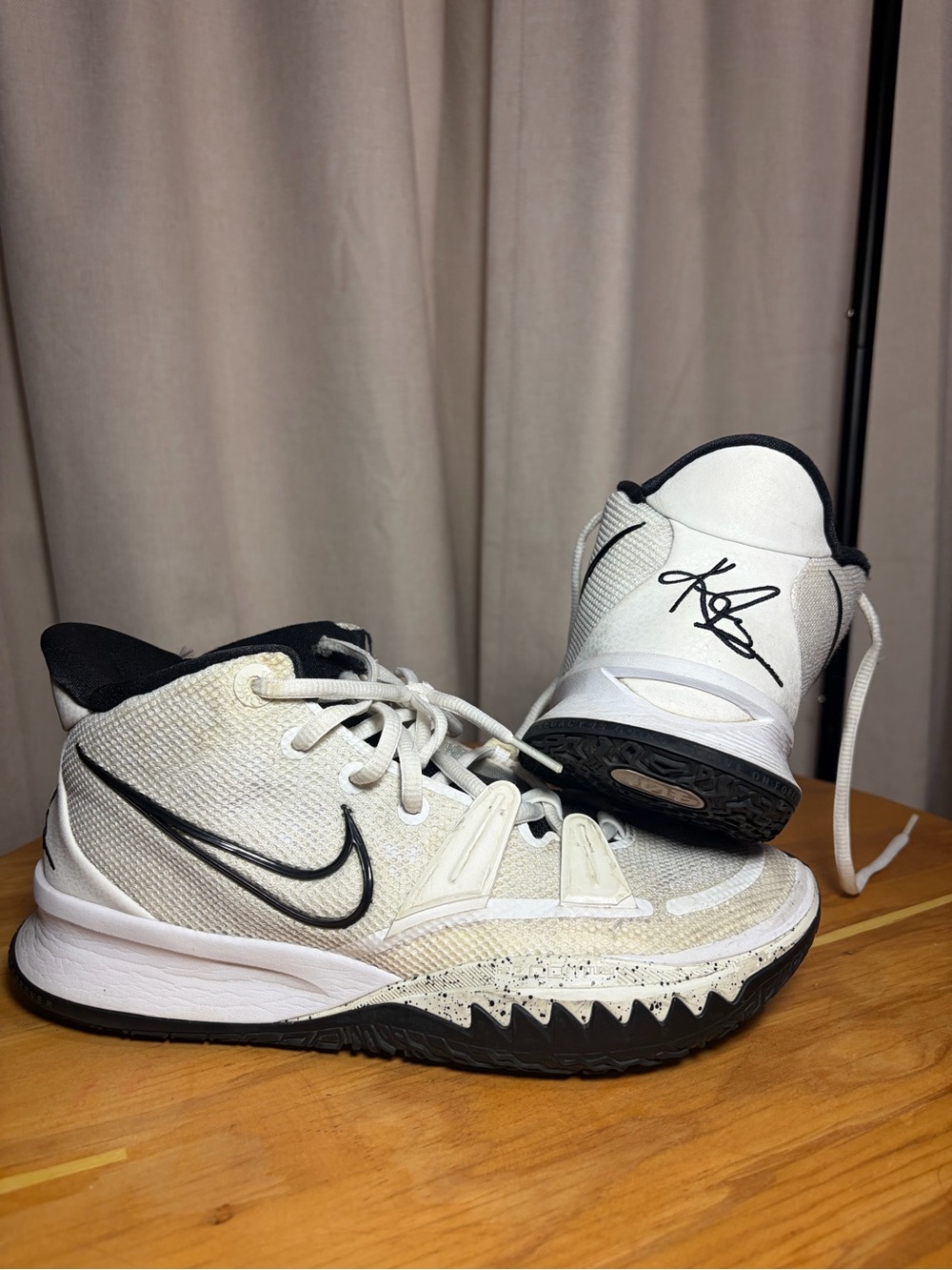 Nike White and Black High-Top Basketball Shoes with Signature Detail